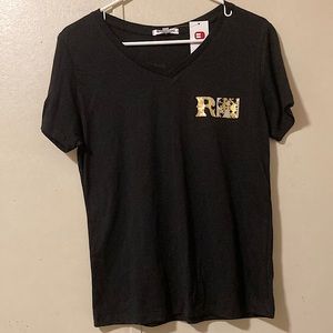 Simple black rock revival tee with gold logo on front and back